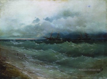  1871 Peintre - navires dans le lever de soleil de la mer orageuse 1871 Romantique Ivan Aivazovsky russe